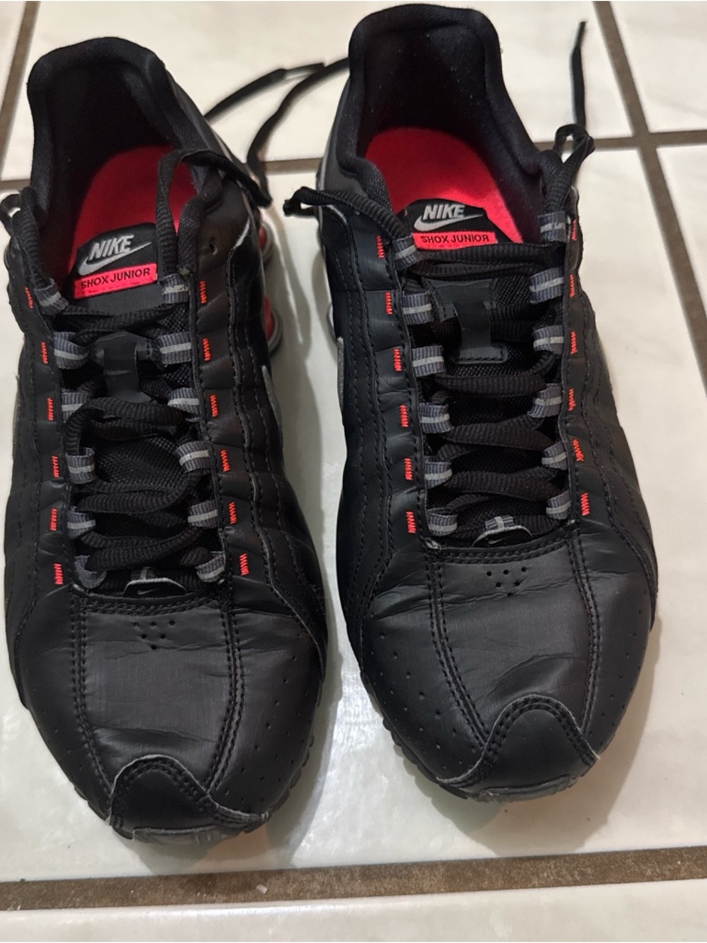 Nike Black Sneakers with Red Accents